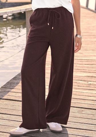 VENICE BEACH - Pierna ancha Pantalón en marrón: frente