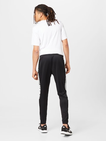 ADIDAS SPORTSWEAR Slim fit Workout Pants 'Tiro Wordmark' in Black