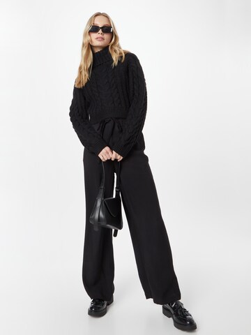 ABOUT YOU Wide leg Trousers 'Simone' in Black
