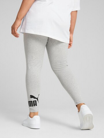 Skinny Pantaloni sportivi 'Ess No. 1' di PUMA in grigio