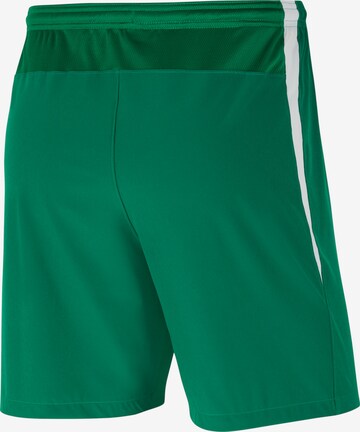 NIKE Regular Workout Pants in Green