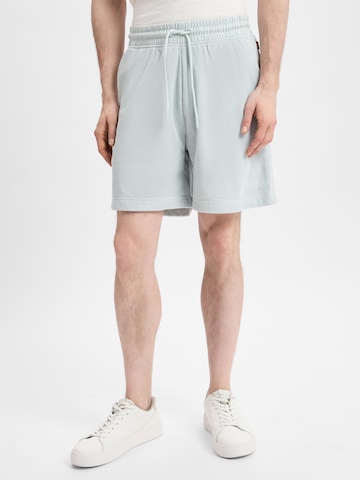BOSS Loose fit Trousers in Green: front