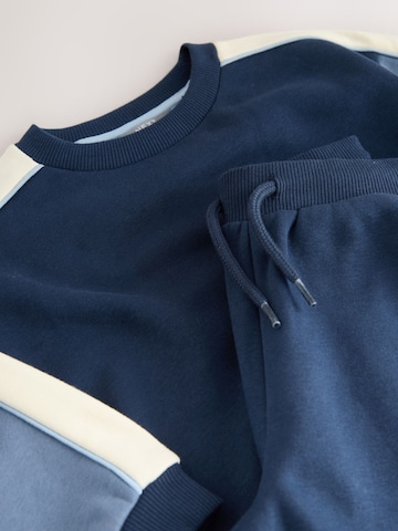 Next - Ropa para correr en azul