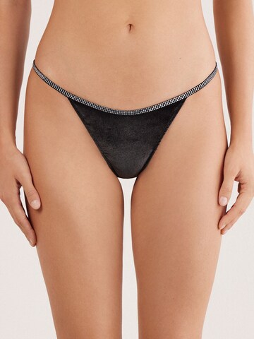 INTIMISSIMI Thong 'Girls Wanna Glisten' in Black: front