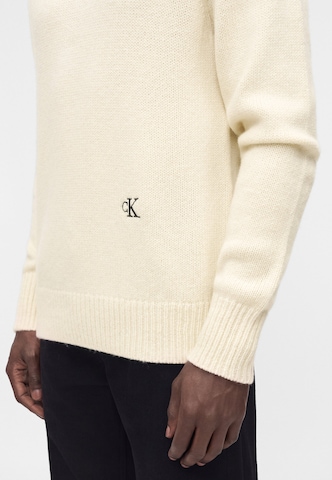 Calvin Klein Jeans - Jersey en beige: lado