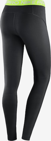 NIKE Skinny Sportbroek in Zwart