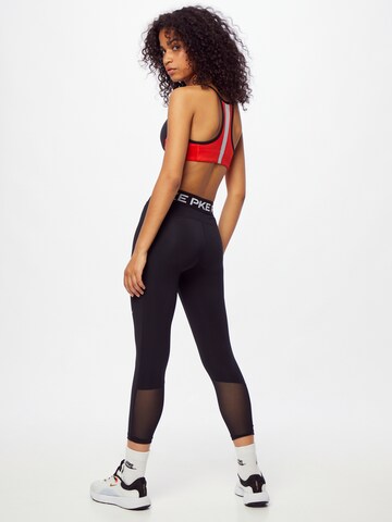 NIKE Skinny Sportbroek in Zwart