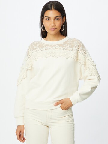 Cream Sweatshirt 'Kalanie' in Beige: voorkant