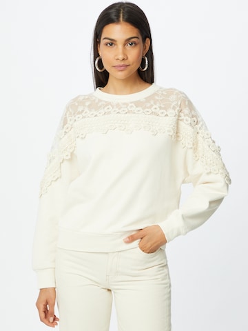CreamSweater majica 'Kalanie' - bež boja: prednji dio