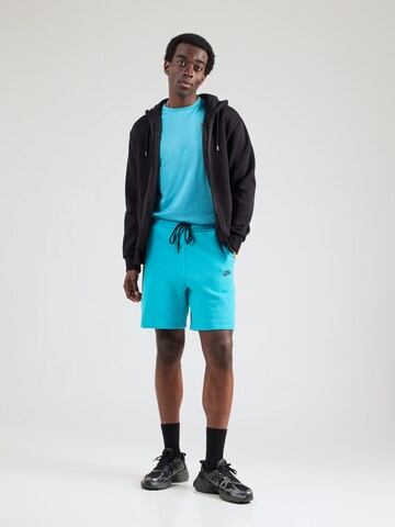 Nike Sportswear Свободный крой Штаны 'TCH FLC' в Зеленый