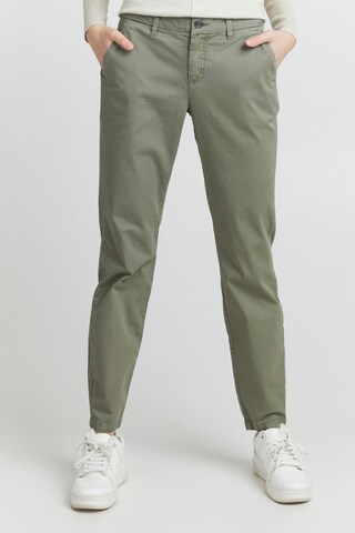 Oxmo Loose fit Chino Pants 'CHILLI' in Green: front