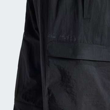 ADIDAS SPORTSWEAR Loose fit Outdoor Pants 'City Escape' in Black