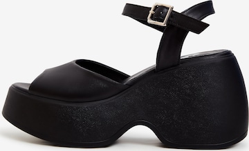 CESARE GASPARI Sandals in Black: front