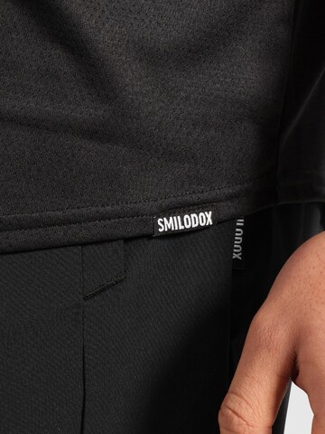 Smilodox T-Shirt 'Powerfit Pro' in Schwarz