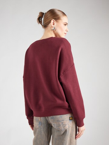 Sweat-shirt 'PCSASIE' PIECES en rouge