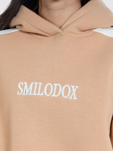 Sweat-shirt 'Malea' Smilodox en beige
