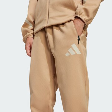 ADIDAS SPORTSWEAR Конический (Tapered) Спортивные штаны 'Z.N.E.' в Бежевый