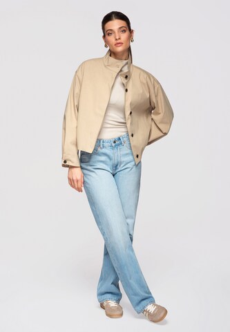 Ombre Tussenjas in Beige