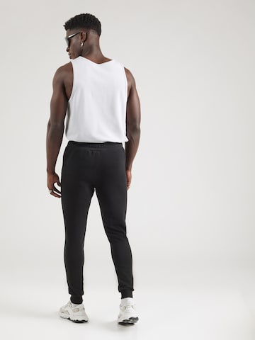 ELLESSE Tapered Sports trousers 'Berlingo' in Black