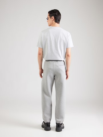 Calvin Klein Jeans - Tapered Calças em cinzento: atrás