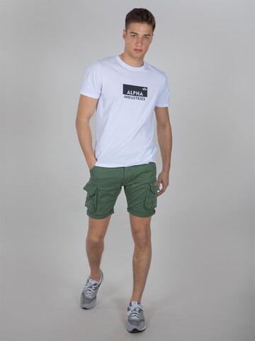 Regular Pantaloni cu buzunare de la ALPHA INDUSTRIES pe verde