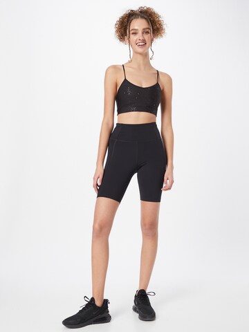 Girlfriend Collective Skinny Sporthose in Schwarz