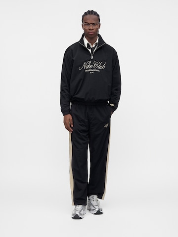 Nike Sportswear Wide leg Byxa 'Club' i svart