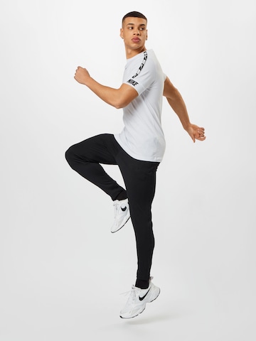 NIKE Slimfit Sportbroek in Zwart