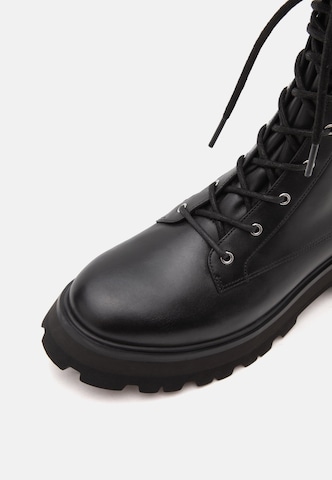 MICHAEL Michael Kors - Botim com fivela 'CALEB' em preto
