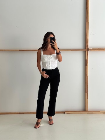 noar studios Boot cut Jeans 'CROPPED DENIM' in Black