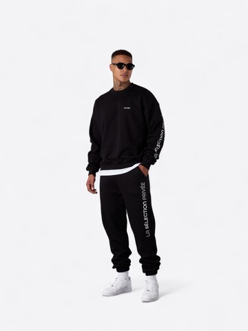 ESTEEM Tapered Trousers 'Sélection Privée' in Black