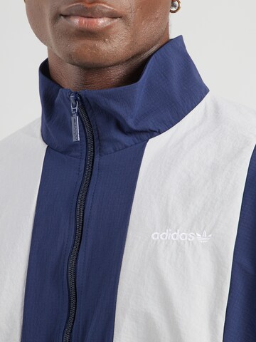 ADIDAS ORIGINALS - Chaqueta de entretiempo en azul