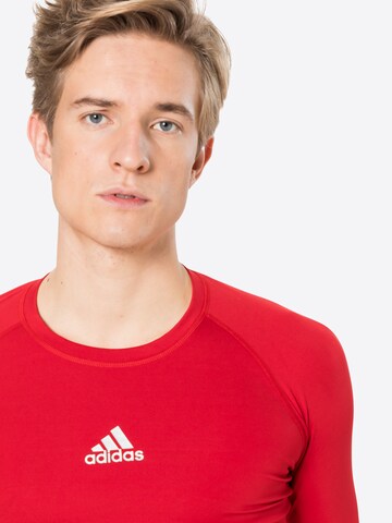 T-Shirt fonctionnel 'Alphaskin' ADIDAS SPORTSWEAR en rouge