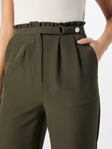 ABOUT YOU Tapered Pleat-Front Pants 'Meline' in Green