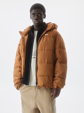 Pull&Bear Winter jacket in Brown: front