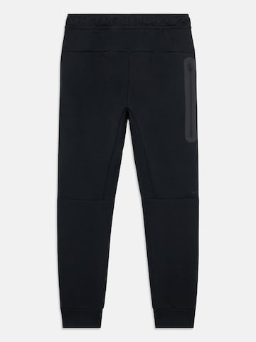 Tapered Pantaloni 'TCH FLC' di Nike Sportswear in nero