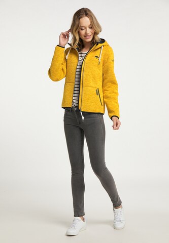Manteau fonctionnel Schmuddelwedda en jaune