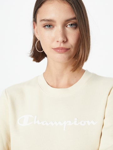 Felpa di Champion Authentic Athletic Apparel in giallo