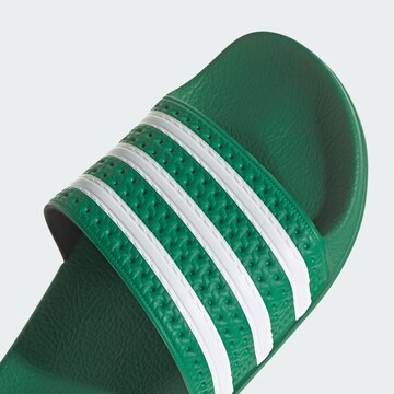 ADIDAS ORIGINALSNatikače s potpeticom 'Adilette' - zelena boja