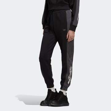 ADIDAS ORIGINALS Tapered Pants in Black: front