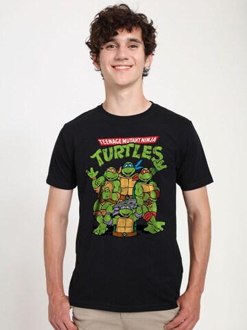 Nickelodeon Shirt‌‌‌‌‌‌‌‌‌‌ in Schwarz