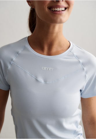 Maglia funzionale di Aim'n in grigio