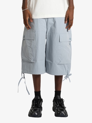 OAMC PEACEMAKER Loose fit Cargo Pants in Blue: front