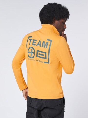 CHIEMSEE Fleece Jacket ' mit großem PlusMinus Print ' in Orange