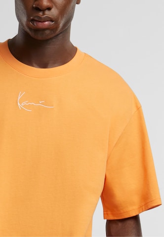 Karl Kani - Camiseta 'Essential' en naranja