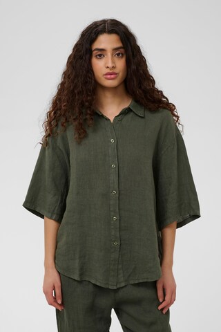 SOAKED IN LUXURY - Camisa em verde: frente