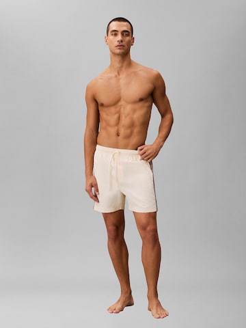 Shorts de bain Calvin Klein Swimwear en beige