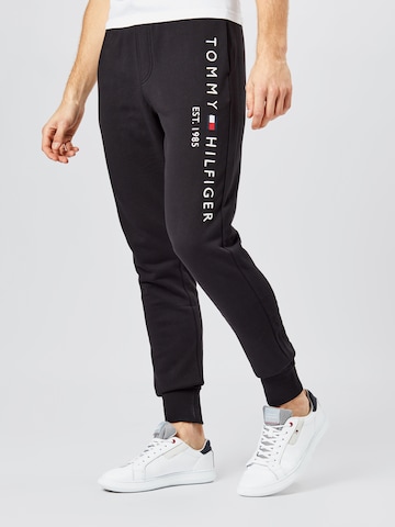 Tapered Pantaloni di TOMMY HILFIGER in nero: frontale