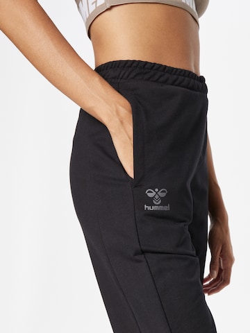 Effilé Pantalon de sport 'OFFGRID' Hummel en noir