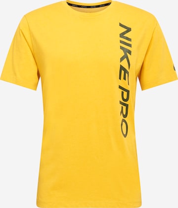 T-Shirt fonctionnel NIKE en jaune : devant